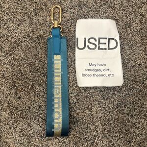 Used blue lululemon keychain 2